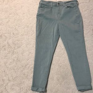 Women’s army green high-rise crop pants.